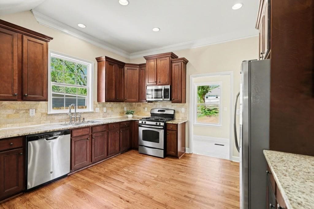 4 bedroom, 3 bathroom, 2,146 sq ft single family residence for sale at 1809 Walker Avenue, Atlanta, GA 30337 — photo 3