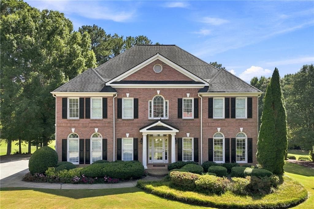 5 bedroom, 4 bathroom, 5,442 sq ft single family residence for sale at 1398 BridgeMill Avenue, Canton, GA 30114 — photo 2