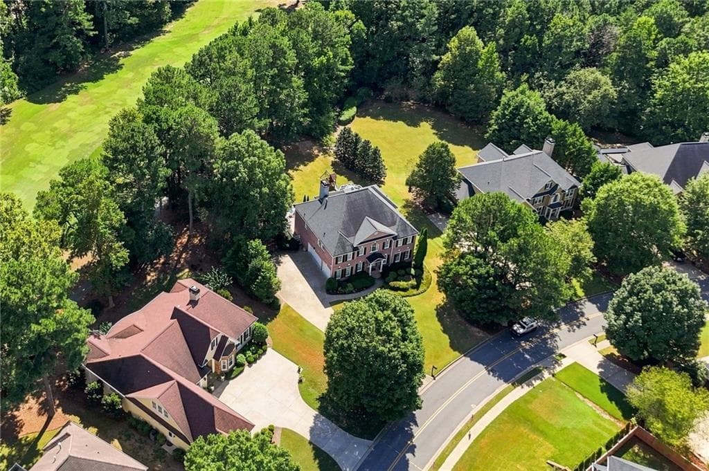 5 bedroom, 4 bathroom, 5,442 sq ft single family residence for sale at 1398 BridgeMill Avenue, Canton, GA 30114 — photo 3