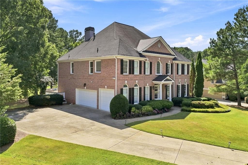5 bedroom, 4 bathroom, 5,442 sq ft single family residence for sale at 1398 BridgeMill Avenue, Canton, GA 30114 — photo 4
