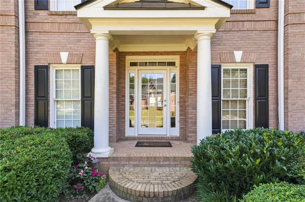 5 bedroom, 4 bathroom, 5,442 sq ft single family residence for sale at 1398 BridgeMill Avenue, Canton, GA 30114 — photo 7