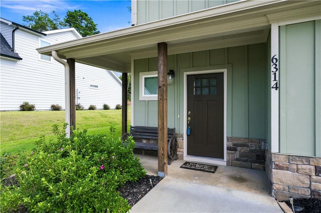 4 bedroom, 3 bathroom, 2,239 sq ft single family residence for sale at 6314 Woodland Station Drive, Lula, GA 30554 — photo 2