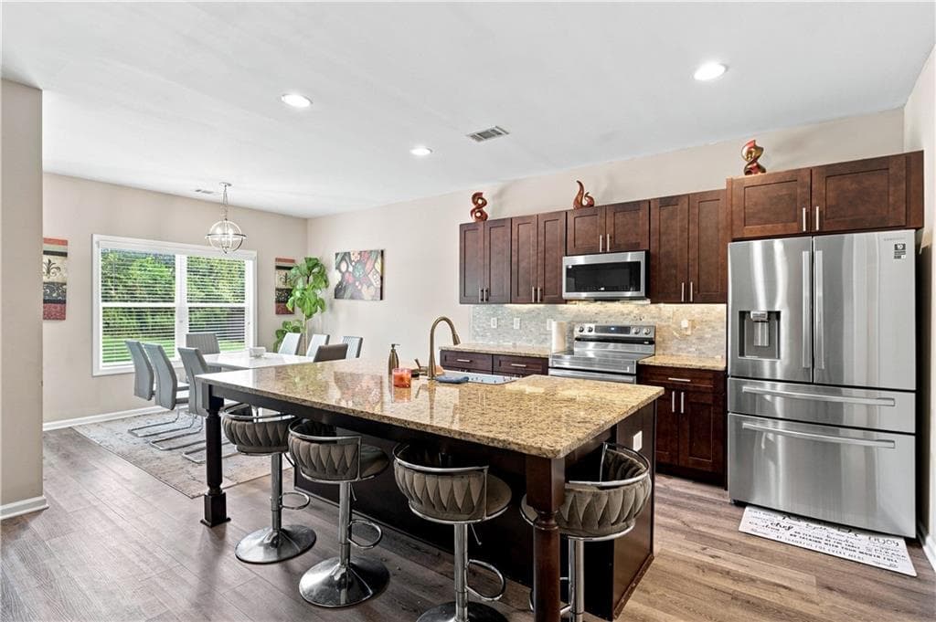 4 bedroom, 3 bathroom, 2,239 sq ft single family residence for sale at 6314 Woodland Station Drive, Lula, GA 30554 — photo 7