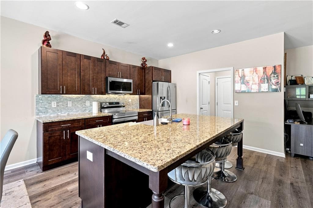 4 bedroom, 3 bathroom, 2,239 sq ft single family residence for sale at 6314 Woodland Station Drive, Lula, GA 30554 — photo 8