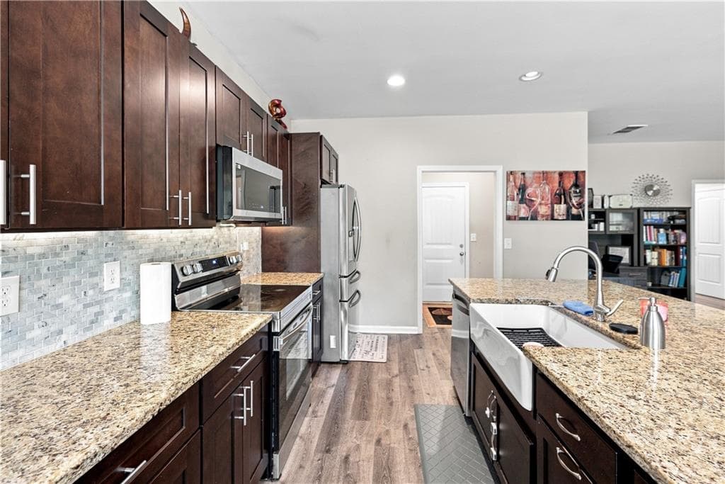 4 bedroom, 3 bathroom, 2,239 sq ft single family residence for sale at 6314 Woodland Station Drive, Lula, GA 30554 — photo 9