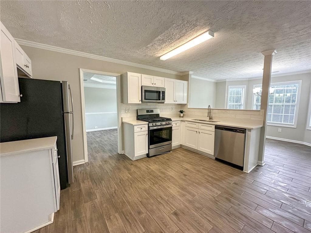 4 bedroom, 3 bathroom, 3,052 sq ft single family residence for sale at 1070 Big Haynes Drive, Grayson, GA 30017 — photo 6