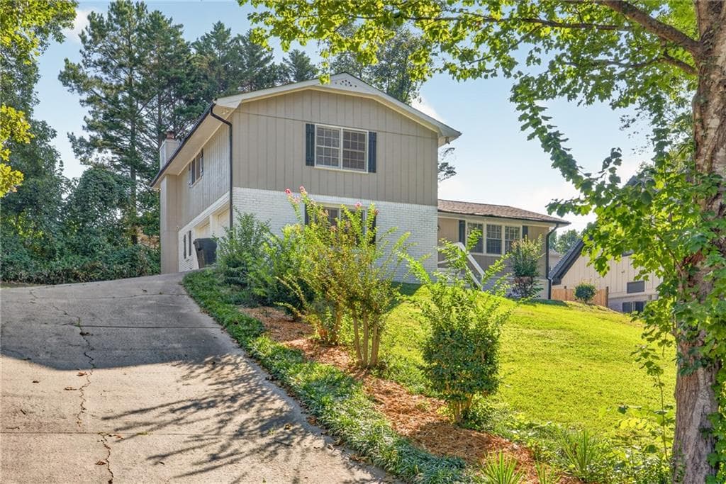 4 bedroom, 3 bathroom single family residence for sale at 3717 Leisure Court, Buford, GA 30519 — photo 2