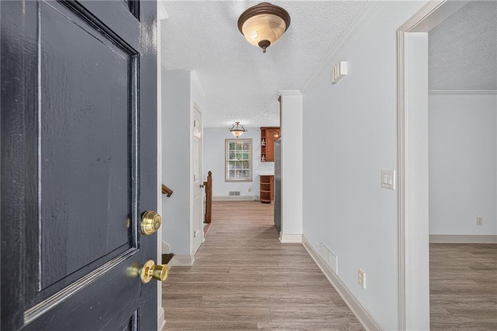 4 bedroom, 3 bathroom single family residence for sale at 3717 Leisure Court, Buford, GA 30519 — photo 3
