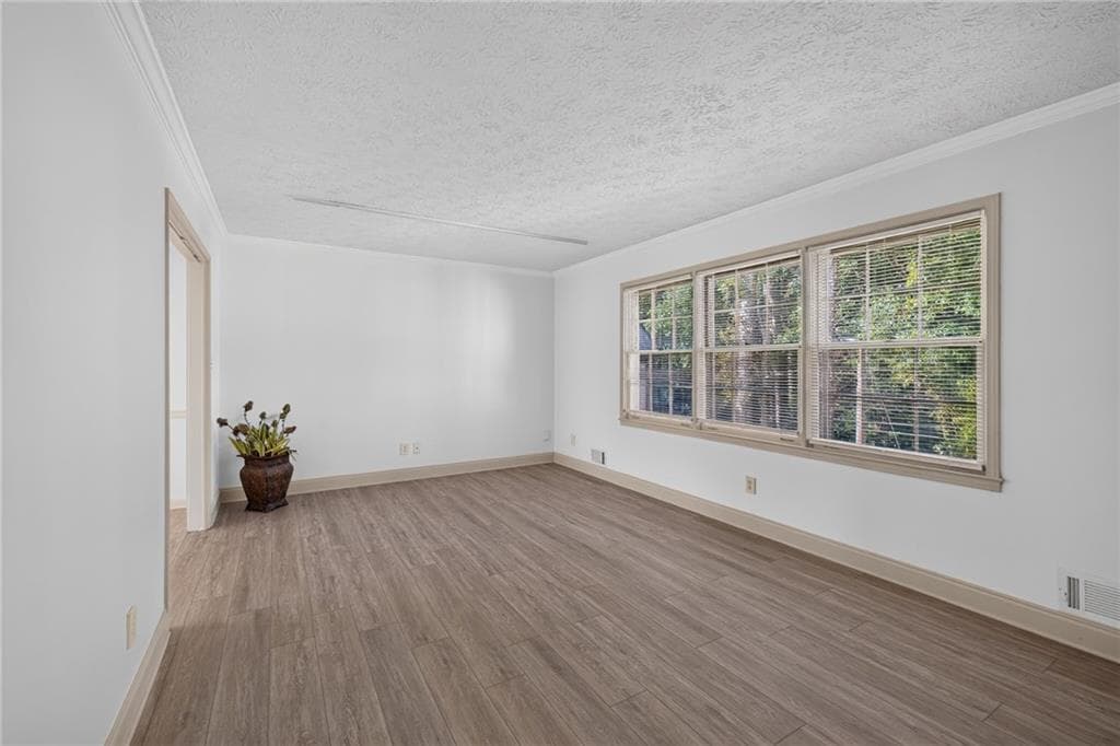 4 bedroom, 3 bathroom single family residence for sale at 3717 Leisure Court, Buford, GA 30519 — photo 6