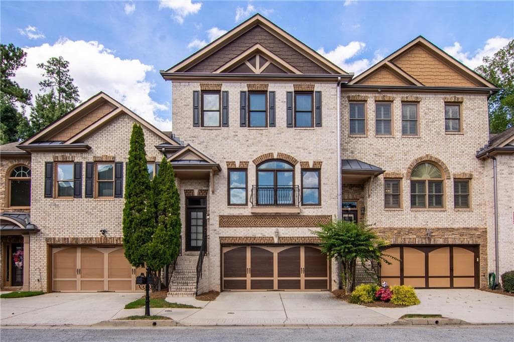 3 bedroom, 4 bathroom, 2,900 sq ft townhouse for sale at 1154 Water Grass Way, Lawrenceville, GA 30045