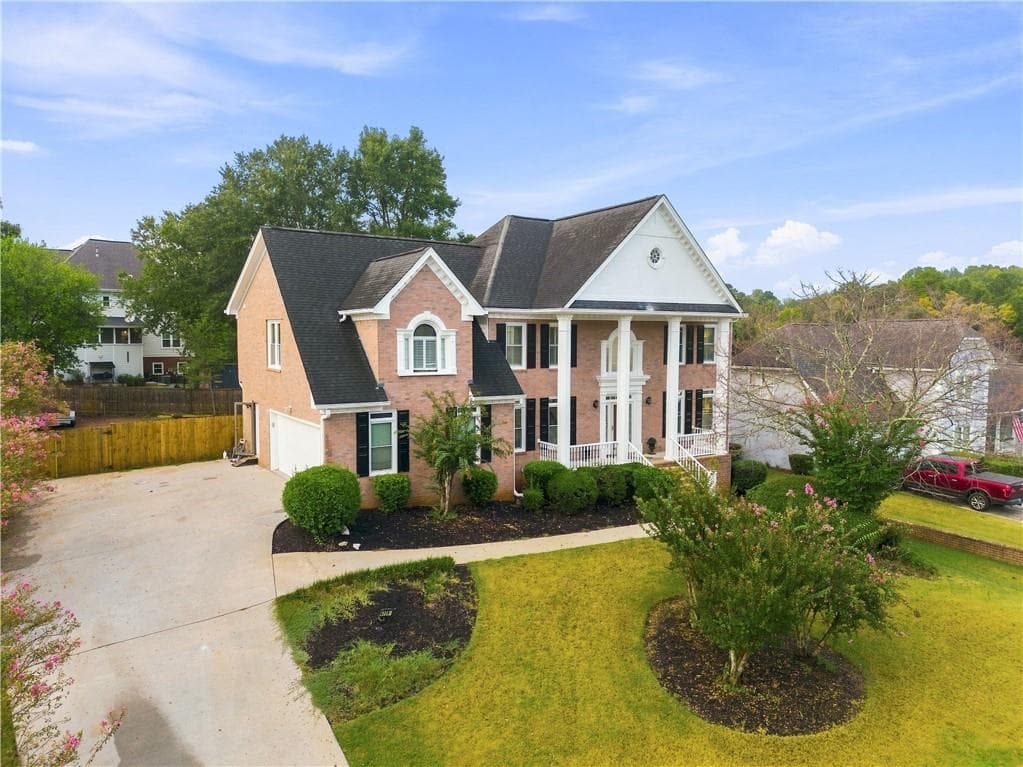 5 bedroom, 5 bathroom, 4,097 sq ft single family residence for sale at 4339 Donerail Drive, Snellville, GA 30039 — photo 2