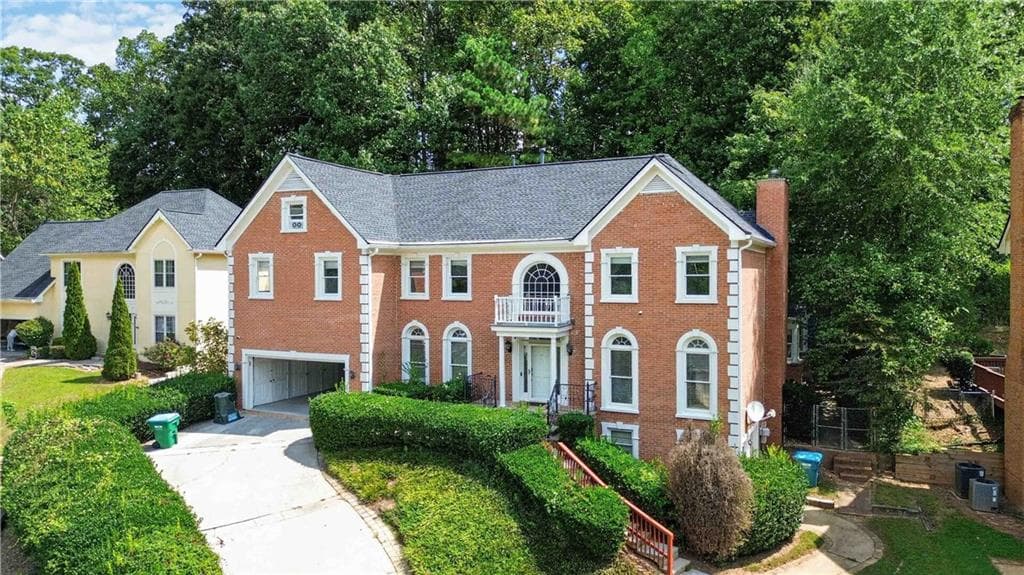 5 bedroom, 5 bathroom, 6,121 sq ft single family residence for sale at 660 Belgrave Lane, Tucker, GA 30084 — photo 2