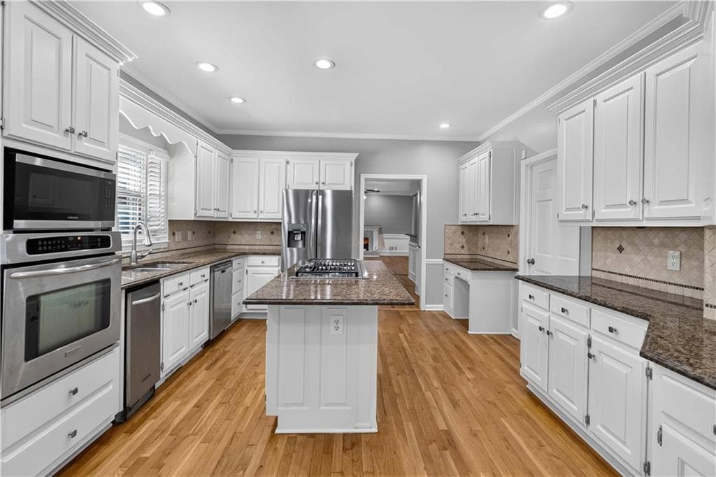 5 bedroom, 5 bathroom, 6,121 sq ft single family residence for sale at 660 Belgrave Lane, Tucker, GA 30084 — photo 10