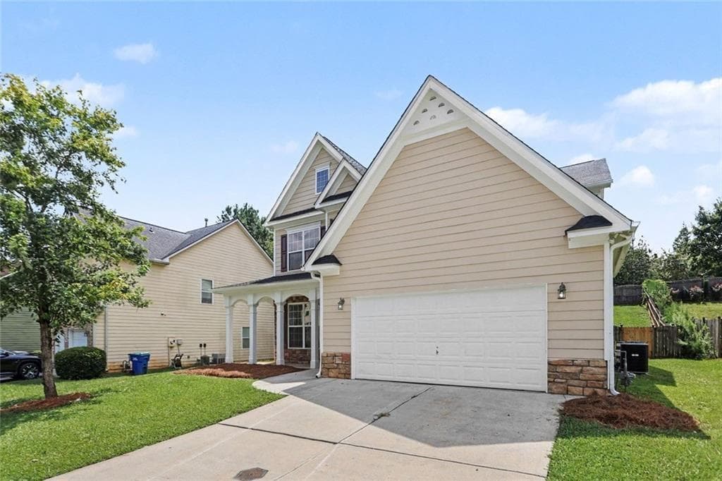 5 bedroom, 3 bathroom, 2,860 sq ft single family residence for sale at 6486 E Stonelake Place, Atlanta, GA 30331 — photo 2
