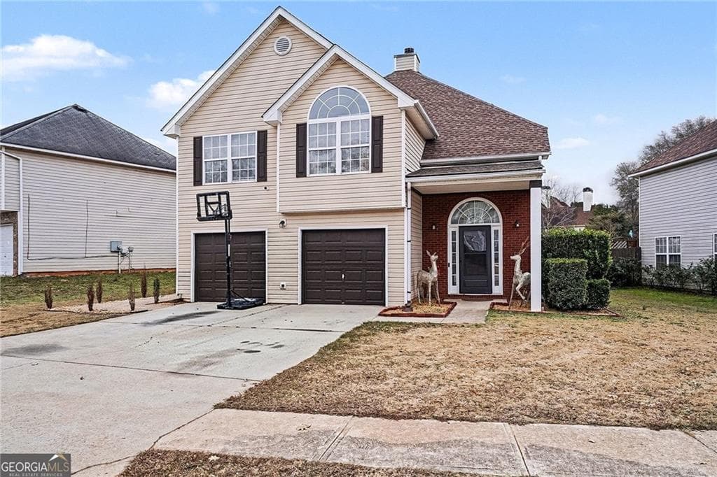 3 bedroom, 3 bathroom, 2,228 sq ft single family residence for sale at 11811 Registry Boulevard, Hampton, GA 30228 — photo 2