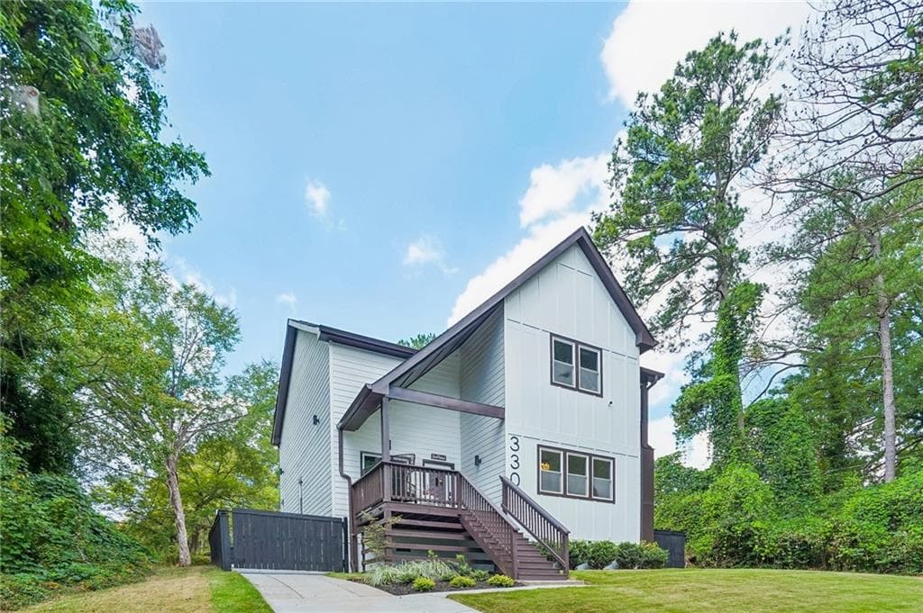 4 bedroom, 3 bathroom, 3,216 sq ft single family residence for sale at 330 Seventh Avenue, Scottdale, GA 30079 — photo 2