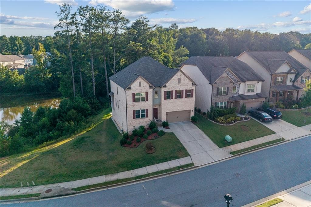 5 bedroom, 5 bathroom, 4,960 sq ft single family residence for sale at 327 Round Pond Drive, Lilburn, GA 30047 — photo 2