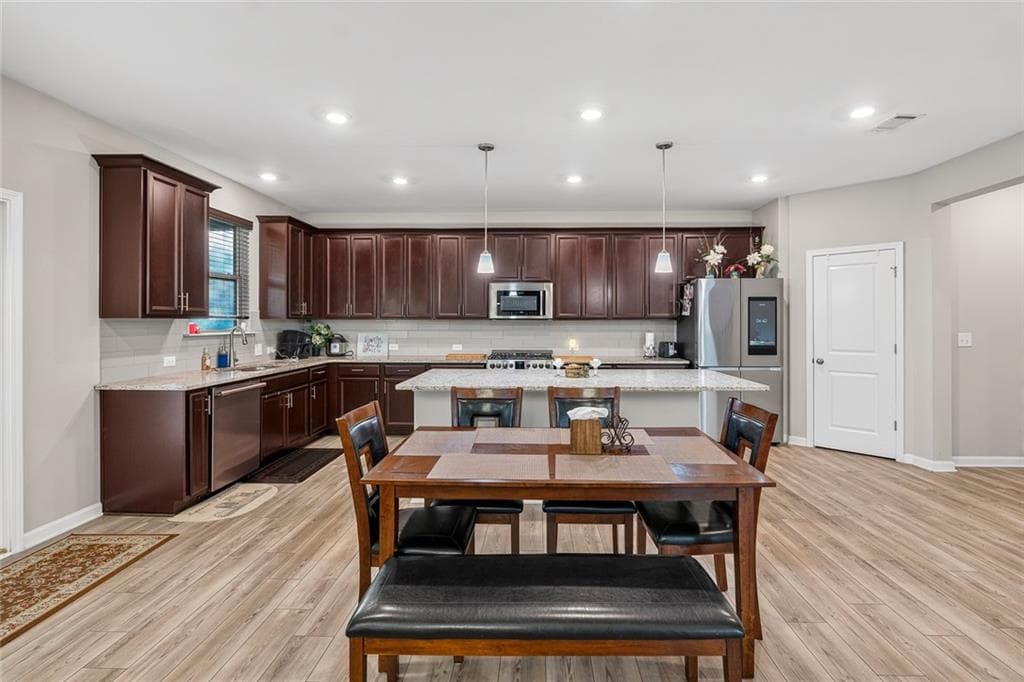 5 bedroom, 5 bathroom, 4,960 sq ft single family residence for sale at 327 Round Pond Drive, Lilburn, GA 30047 — photo 6