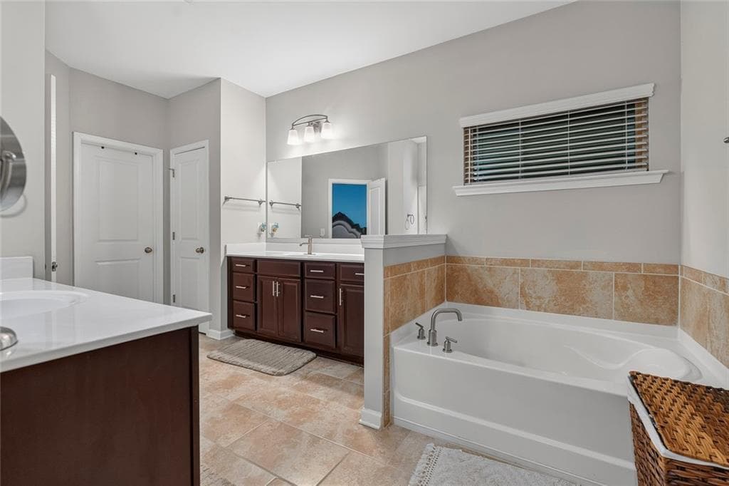 5 bedroom, 5 bathroom, 4,960 sq ft single family residence for sale at 327 Round Pond Drive, Lilburn, GA 30047 — photo 10