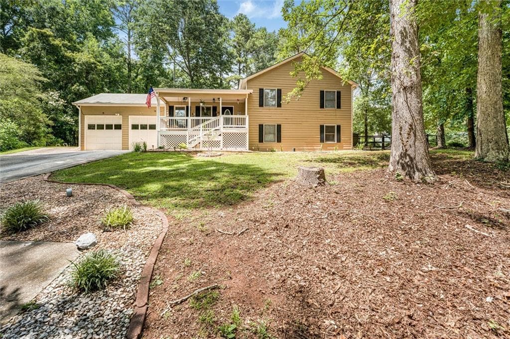 4 bedroom, 3 bathroom, 2,200 sq ft single family residence for sale at 1601 River Glen Road, Auburn, GA 30011