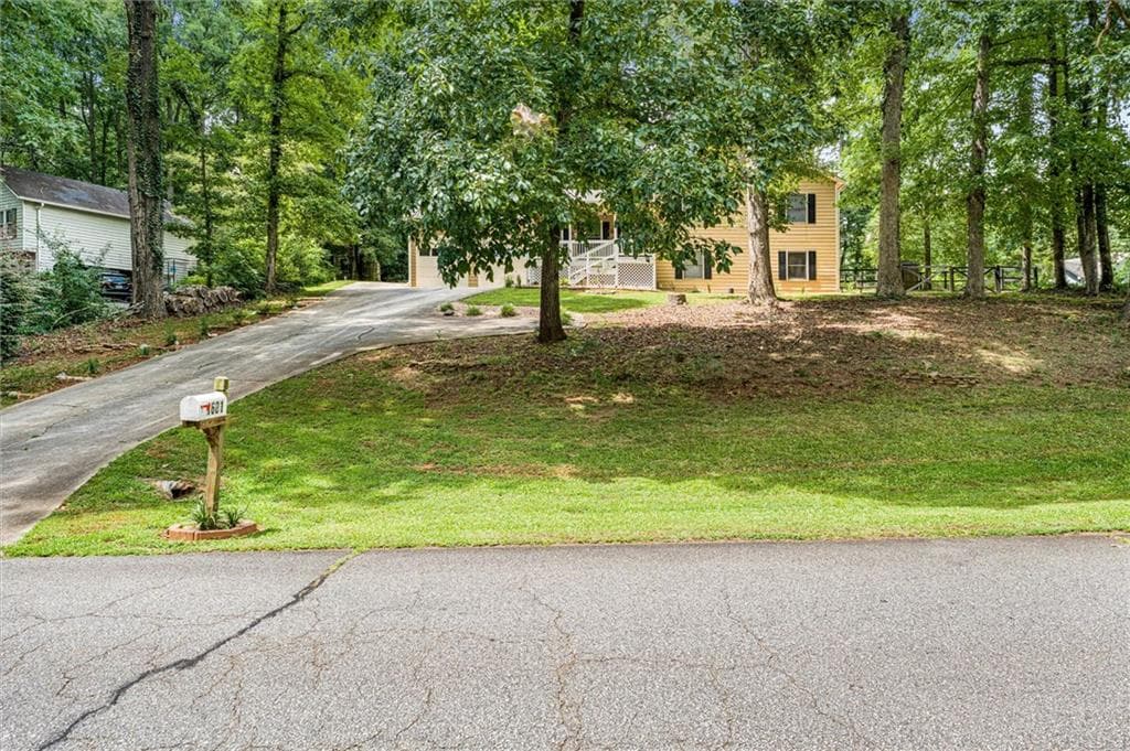 4 bedroom, 3 bathroom, 2,200 sq ft single family residence for sale at 1601 River Glen Road, Auburn, GA 30011 — photo 2