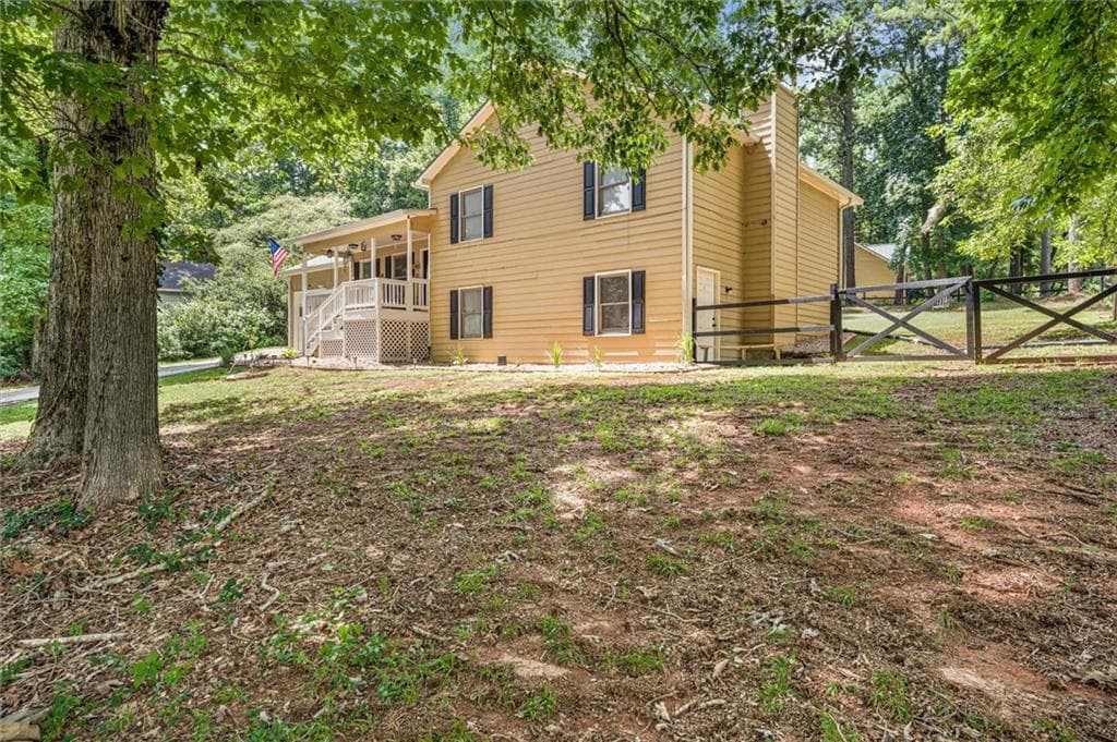 4 bedroom, 3 bathroom, 2,200 sq ft single family residence for sale at 1601 River Glen Road, Auburn, GA 30011 — photo 5