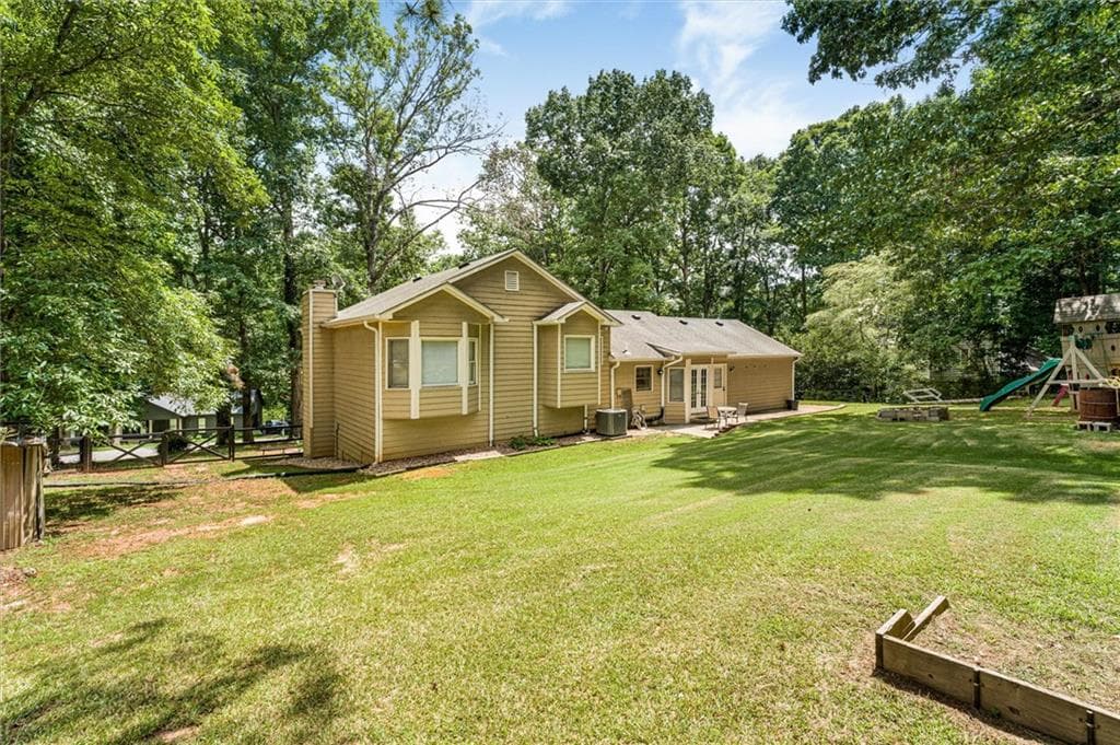 4 bedroom, 3 bathroom, 2,200 sq ft single family residence for sale at 1601 River Glen Road, Auburn, GA 30011 — photo 10
