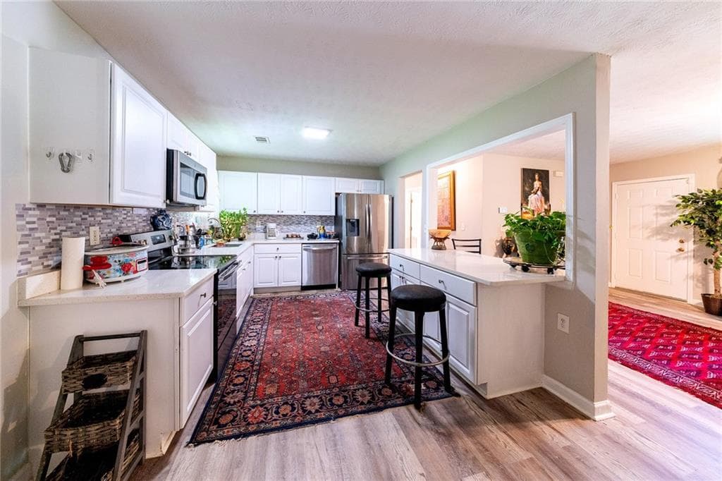 3 bedroom, 2 bathroom, 1,067 sq ft single family residence for sale at 2985 Catalina Drive, Decatur, GA 30032 — photo 2