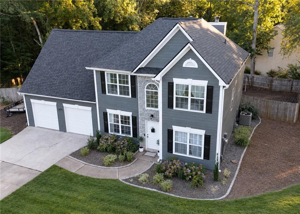 4 bedroom, 3 bathroom, 2,115 sq ft single family residence for sale at 3675 Wake Robin Way, Cumming, GA 30028 — photo 1 of 45