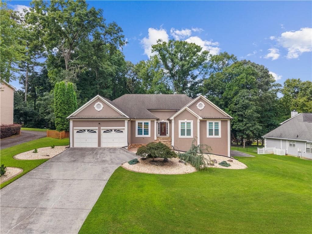 4 bedroom, 2 bathroom, 3,020 sq ft single family residence for sale at 6023 Wyndham Woods Drive, Powder Springs, GA 30127 — photo 2