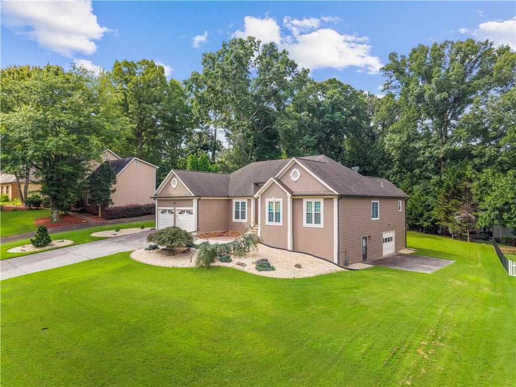 4 bedroom, 2 bathroom, 3,020 sq ft single family residence for sale at 6023 Wyndham Woods Drive, Powder Springs, GA 30127 — photo 3