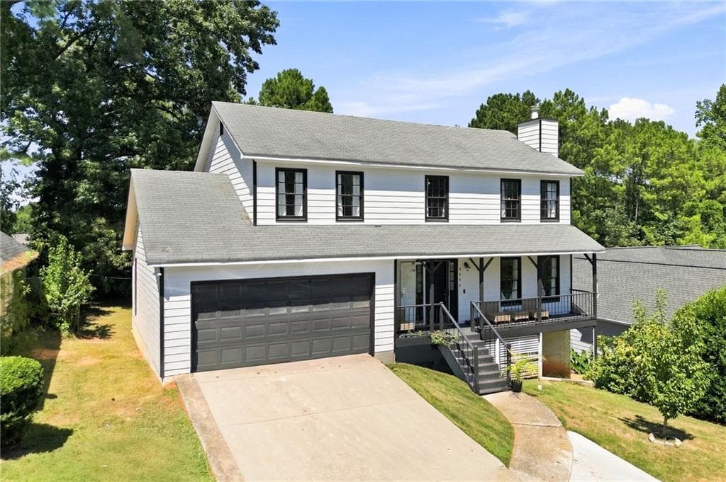 6 bedroom, 4 bathroom, 2,206 sq ft single family residence for sale at 2555 Waterford Park Drive, Lawrenceville, GA 30044 — photo 2