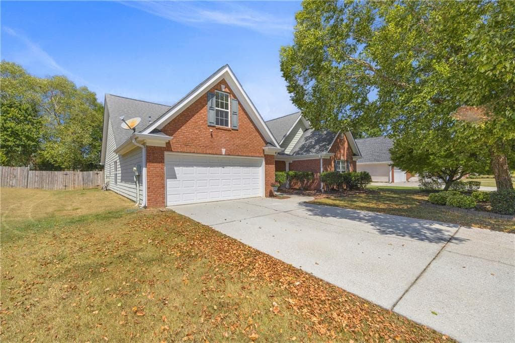 3 bedroom, 2 bathroom, 2,750 sq ft single family residence for sale at 1477 Abbie Kilgore Way, Loganville, GA 30052 — photo 2