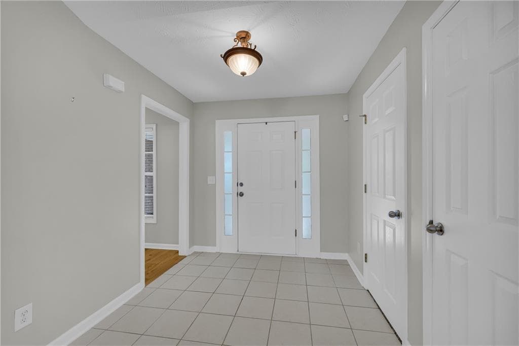 3 bedroom, 2 bathroom, 2,750 sq ft single family residence for sale at 1477 Abbie Kilgore Way, Loganville, GA 30052 — photo 7