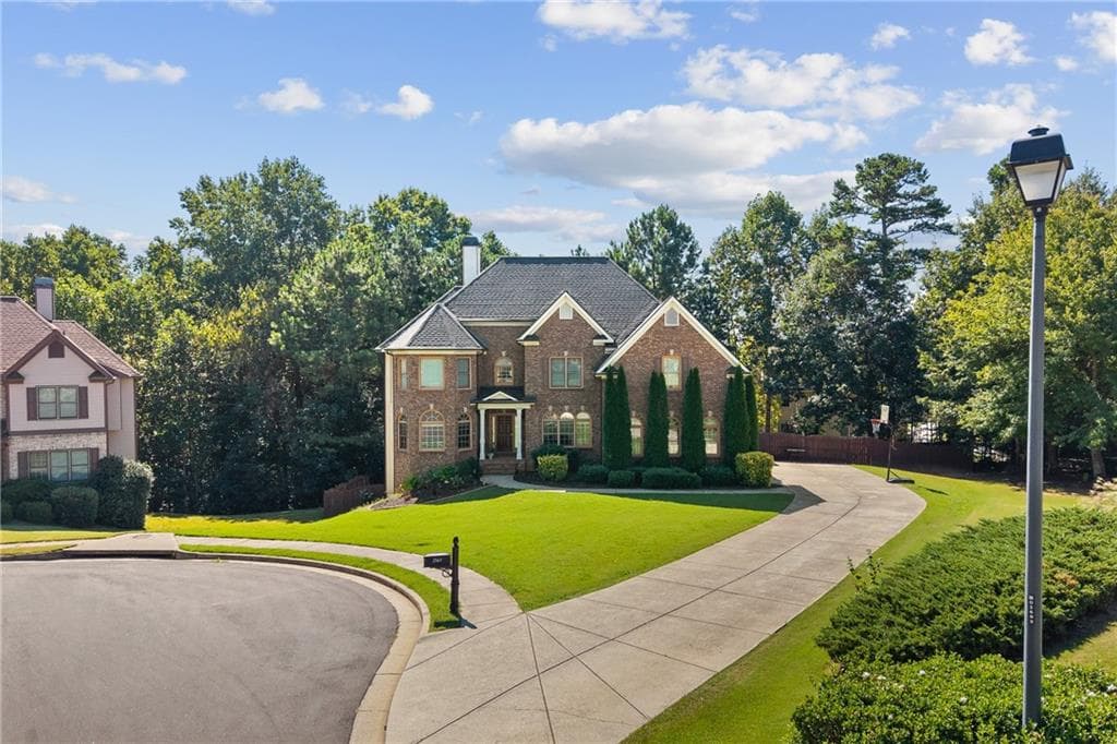 5 bedroom, 5 bathroom, 5,638 sq ft single family residence for sale at 2563 Bogan Bridge Circle, Buford, GA 30519 — photo 2
