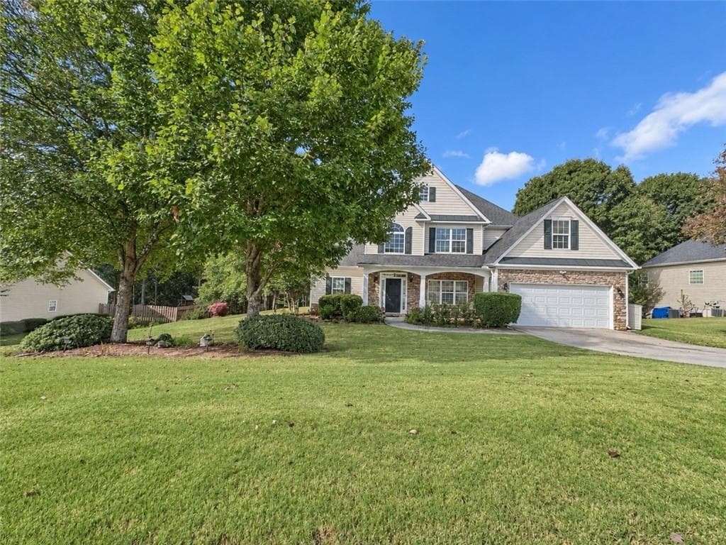 5 bedroom, 3 bathroom, 2,321 sq ft single family residence for sale at 1026 Mason Lee Ave, Loganville, GA 30052 — photo 2