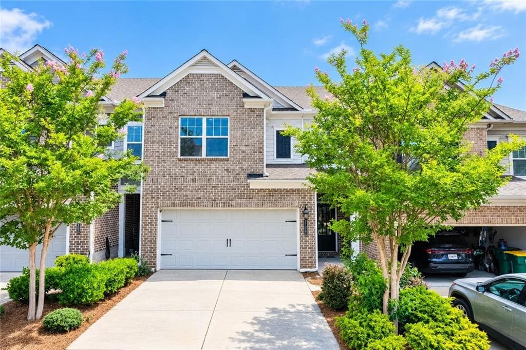 4 bedroom, 3 bathroom, 2,036 sq ft townhouse for sale at 11661 Davenport Lane, Johns Creek, GA 30005