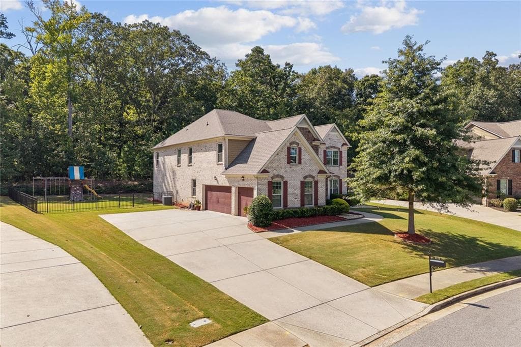 5 bedroom, 4 bathroom, 4,244 sq ft single family residence for sale at 9270 Colham Drive, Cumming, GA 30041 — photo 4