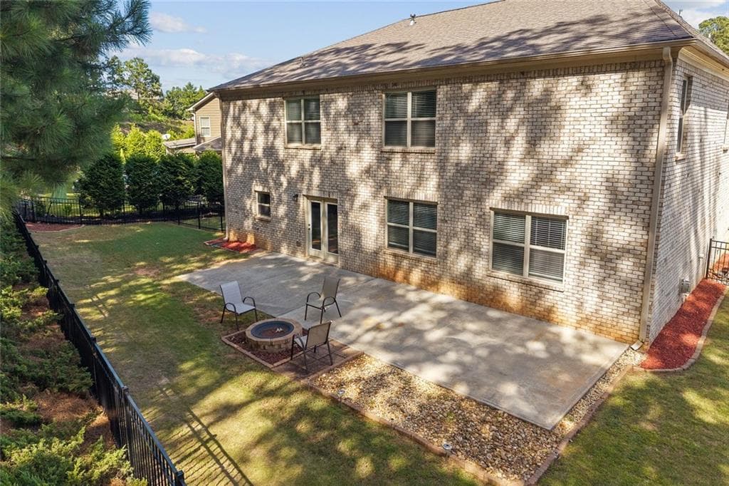 5 bedroom, 4 bathroom, 4,244 sq ft single family residence for sale at 9270 Colham Drive, Cumming, GA 30041 — photo 2