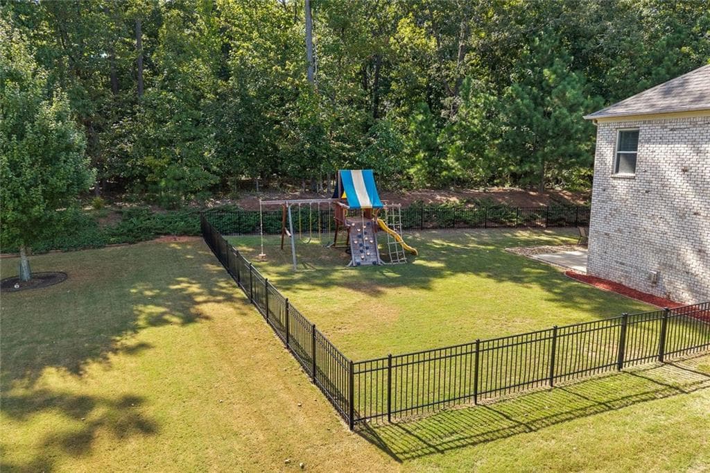 5 bedroom, 4 bathroom, 4,244 sq ft single family residence for sale at 9270 Colham Drive, Cumming, GA 30041 — photo 3