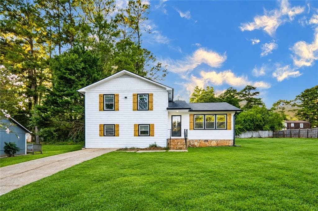 4 bedroom, 3 bathroom, 1,680 sq ft single family residence for sale at 384 Mephisto Circle, Lawrenceville, GA 30046 — photo 1 of 30
