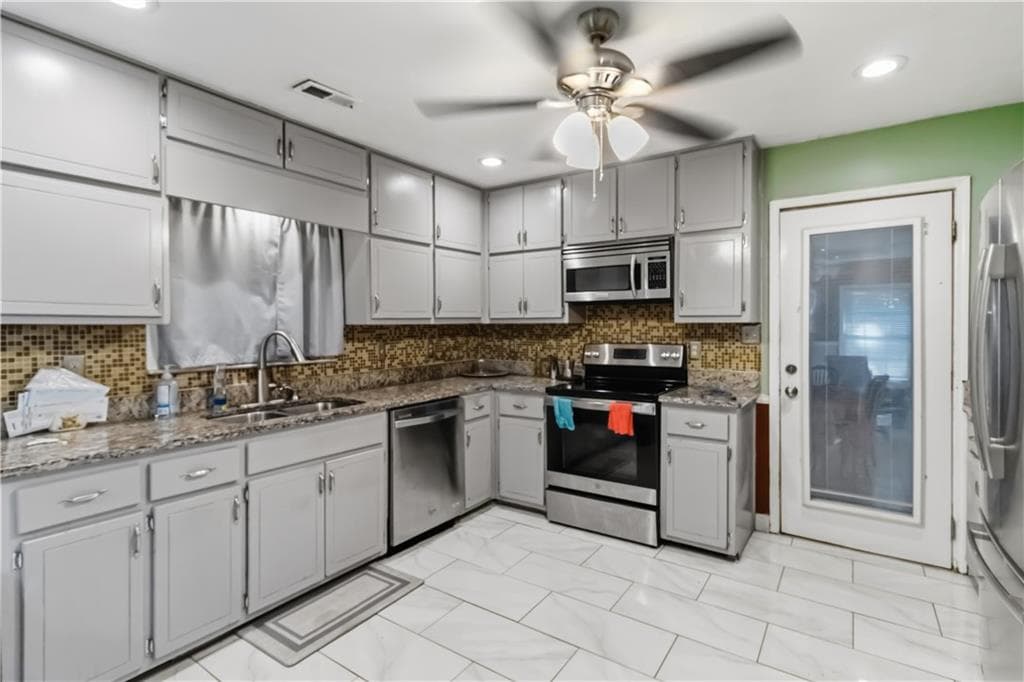 4 bedroom, 4 bathroom, 1,986 sq ft single family residence for sale at 7518 Lerose Drive, Jonesboro, GA 30236 — photo 9