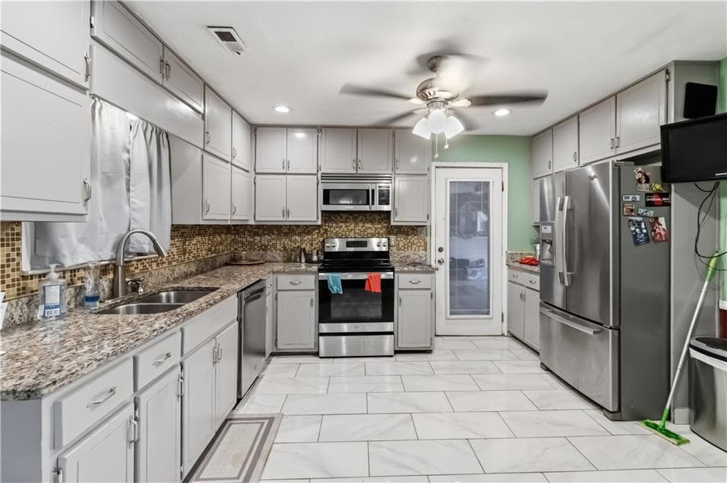 4 bedroom, 4 bathroom, 1,986 sq ft single family residence for sale at 7518 Lerose Drive, Jonesboro, GA 30236 — photo 10