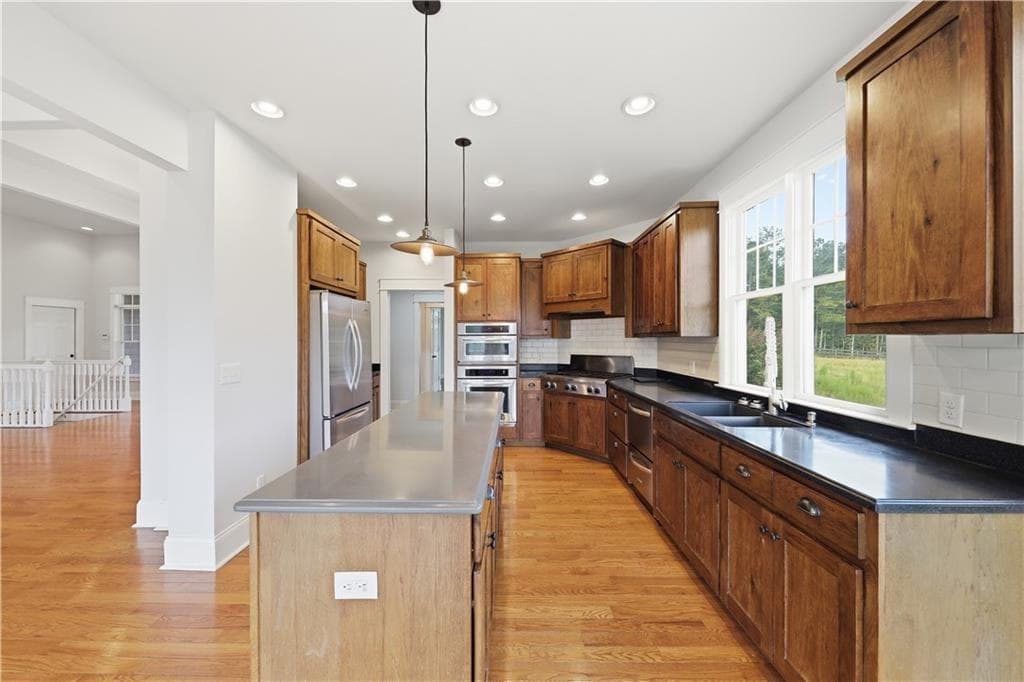 6 bedroom, 4 bathroom, 4,576 sq ft single family residence for sale at 7226 Tyree Road, Winston, GA 30187 — photo 2