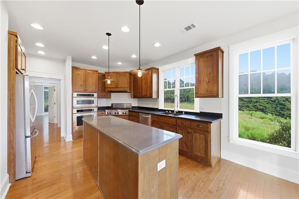 6 bedroom, 4 bathroom, 4,576 sq ft single family residence for sale at 7226 Tyree Road, Winston, GA 30187 — photo 10