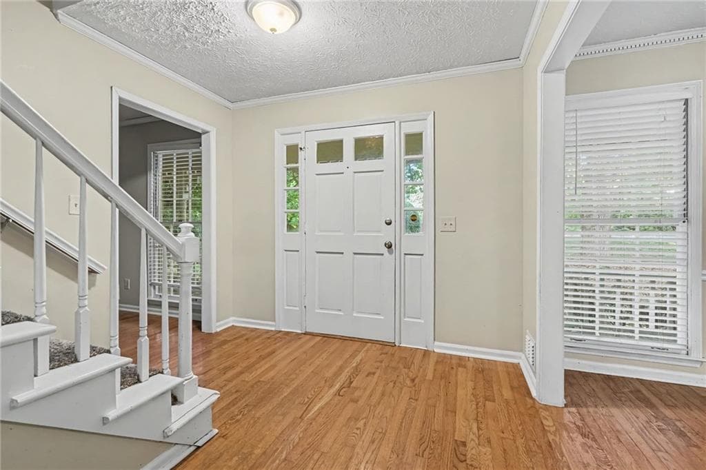 4 bedroom, 3 bathroom, 3,113 sq ft single family residence under contract at 1465 Lake Lucerne Road, Lilburn, GA 30047 — photo 2