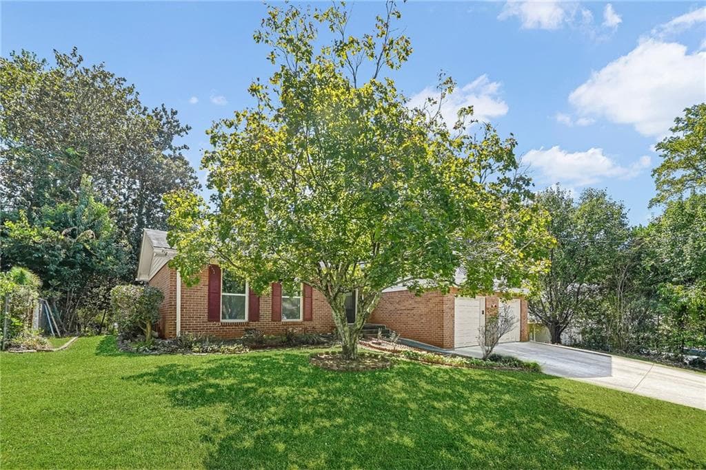 4 bedroom, 2 bathroom, 2,175 sq ft single family residence for sale at 3103 Windfield Circle, Tucker, GA 30084 — photo 2