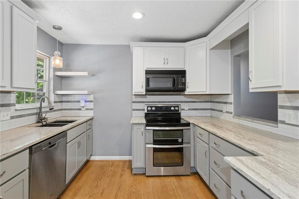 4 bedroom, 2 bathroom, 1,152 sq ft single family residence for sale at 31 Trina Avenue, Kennesaw, GA 30144 — photo 5