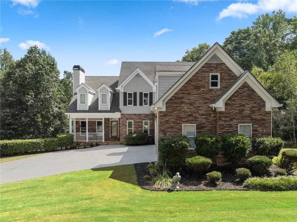 6 bedroom, 5 bathroom, 4,739 sq ft single family residence for sale at 1522 Gracebrook Drive, Lawrenceville, GA 30045 — photo 4