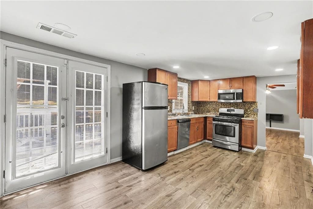 4 bedroom, 2 bathroom, 2,102 sq ft single family residence for sale at 3898 Panthersville Road, Ellenwood, GA 30294 — photo 4